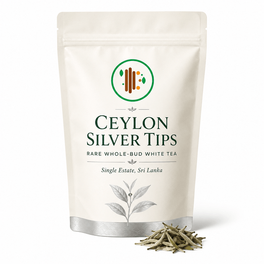 White resealable bag of Ceylon Silver Tips whole bud white tea with a minimalist label, green and brown logo, and a tea leaf illustration, SKU: CEYLONSILVERTIPS25